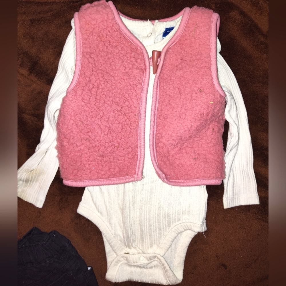 Baby girls fur vest with long sleeve ruffled shouldered onesie like brand new.